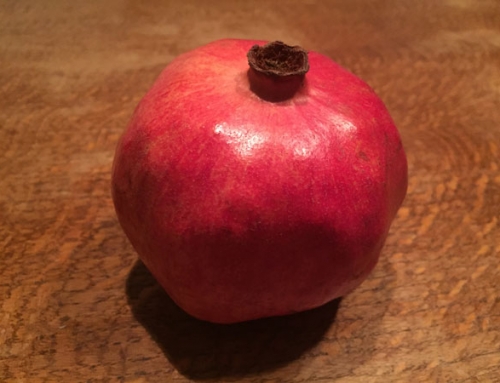 Spanking a pomegranate